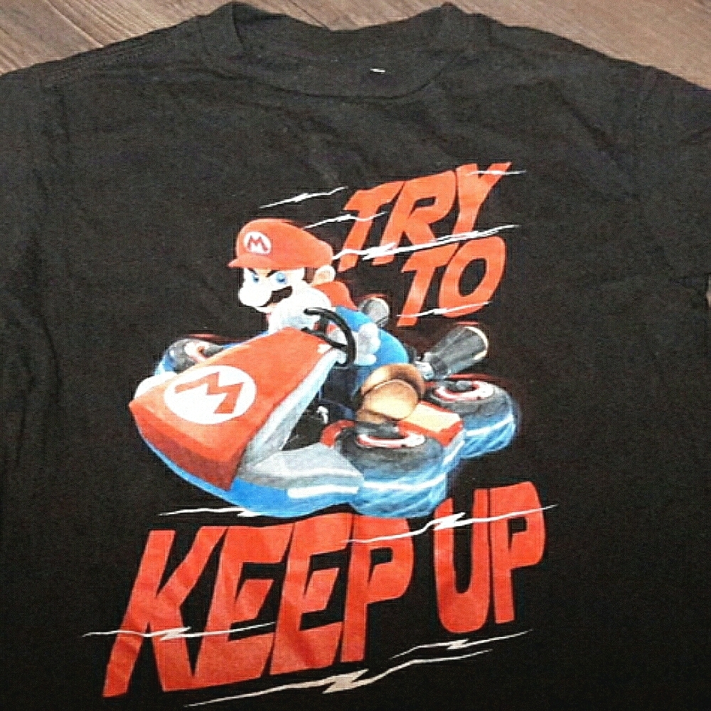 Bundle of 2/kid's tee shirts/Both black/Gently Used